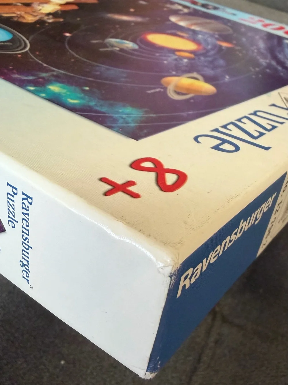 Ravensburger Space Solar System Puzzle with Purple Starfield and Yellow Sun